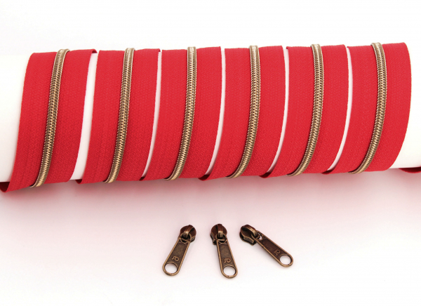 Endlosreißverschluss metallisiert schmal erdbeerrot/messing-antik (1m)